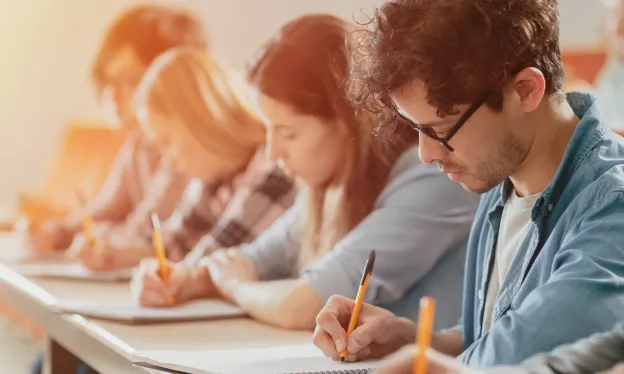 students working on exam